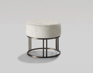 Pouf Orion in padded fabric with metal base by Twils.