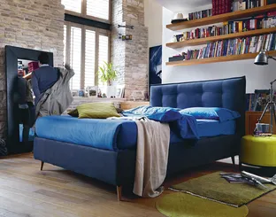 Modern bed with quilted headboard Bob Capitonné by Noctis.