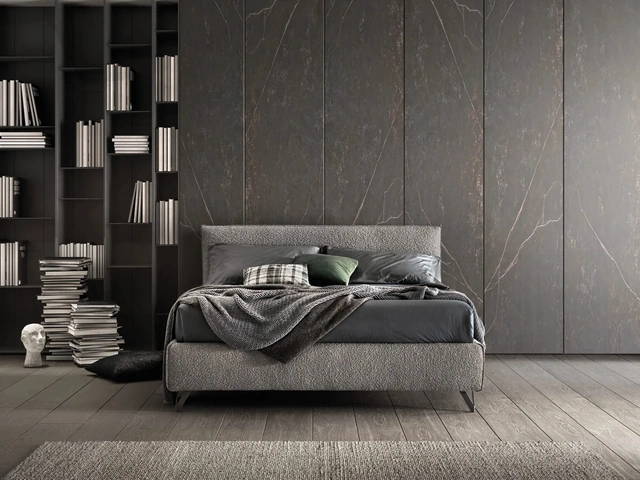 Bed with a wooden structure padded and covered in Good fabric by Bside.