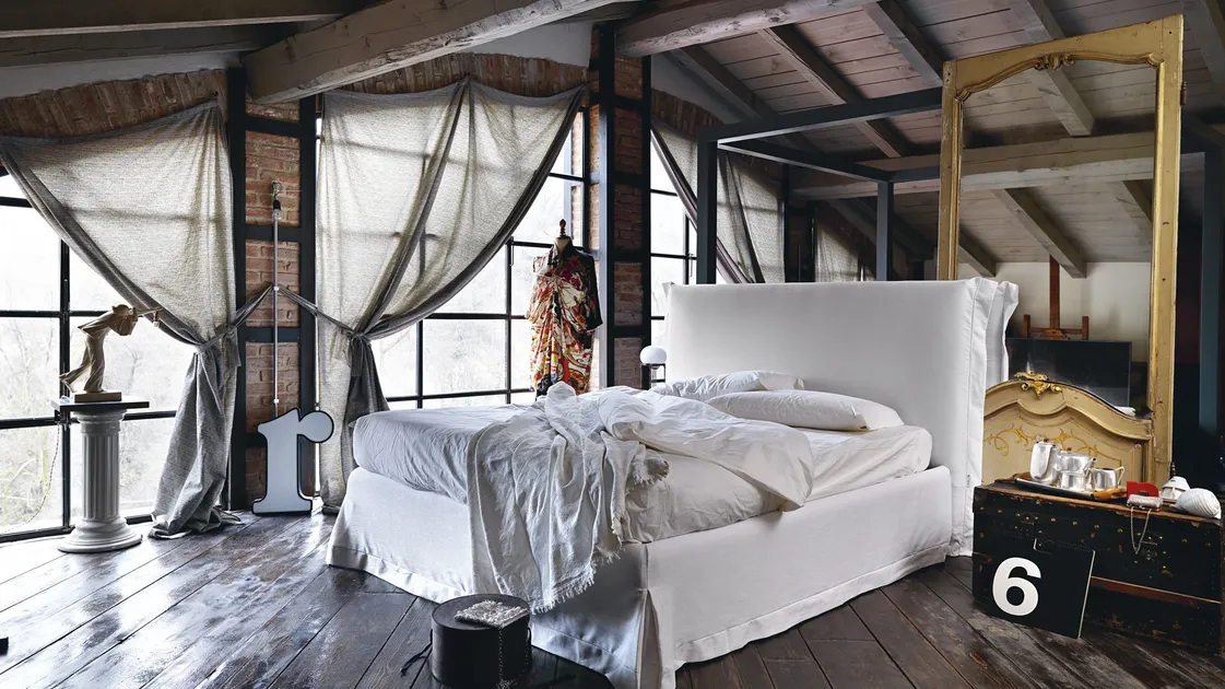 Chloè upholstered headboard bed by Noctis.