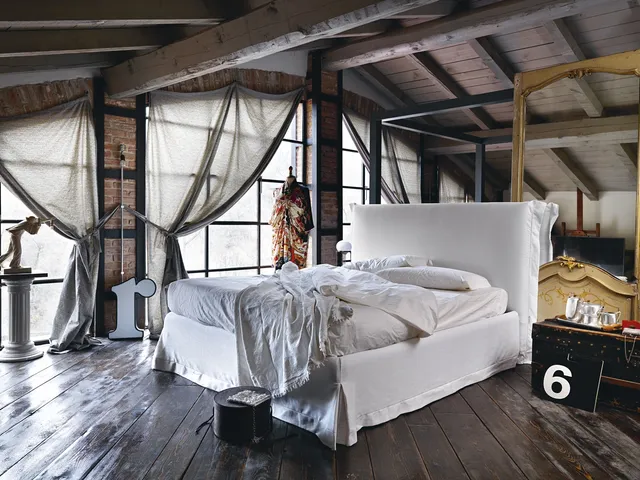 Chloè upholstered headboard bed by Noctis.