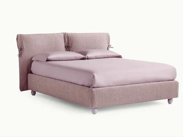 Eden Advance padded bed in fabric with headboard with Noctis flakes.