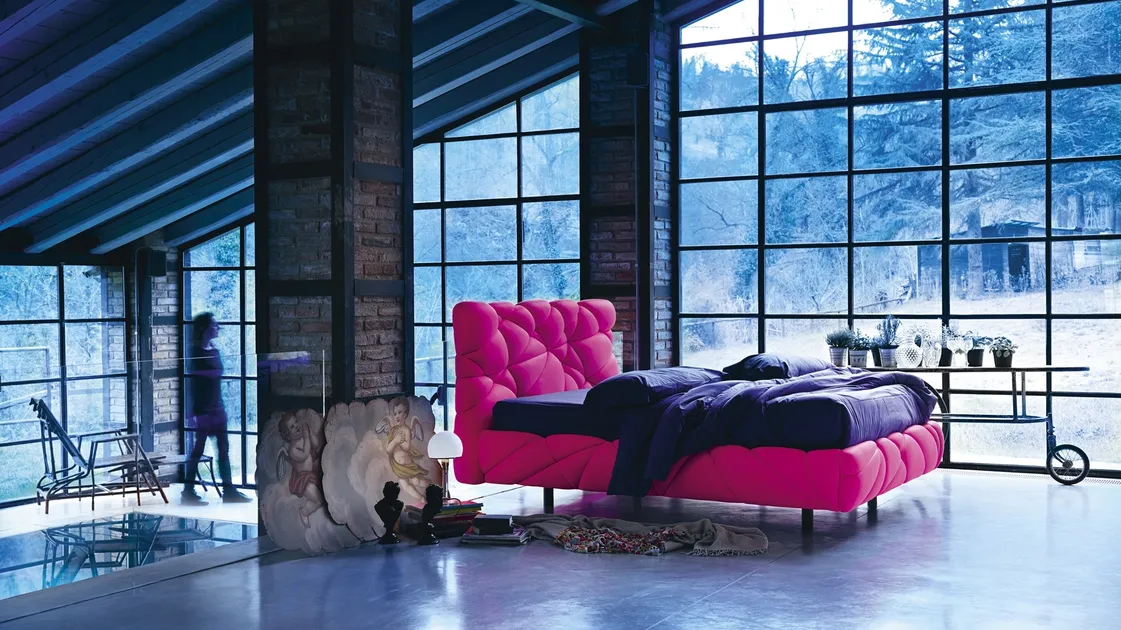 Design bed upholstered and soft as a cloud covered with Lycra Marvin fabric by Noctis.