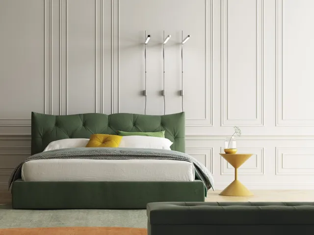 Fabric bed with quilted Meneo design and storage container by Biba Salotti.