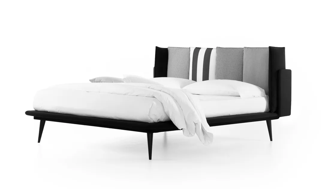 Bed with Birdland headboard by Noctis.