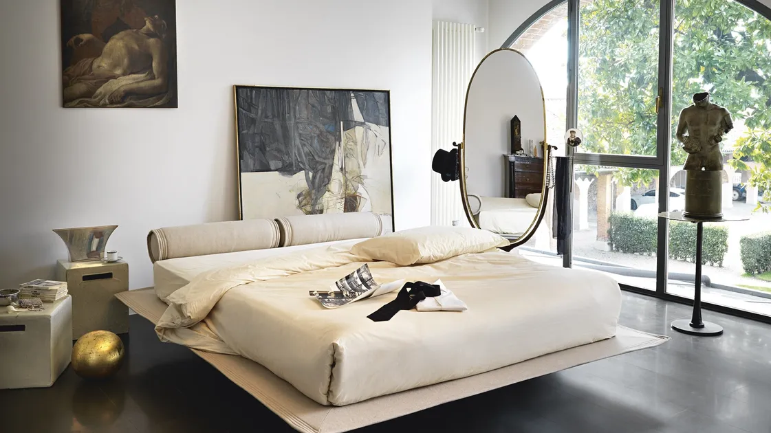 Bed with rolled headboard and rear feet so that they are invisible Flamingo by Noctis