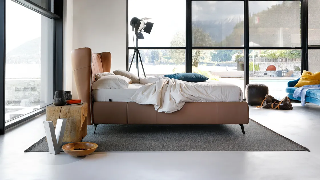 Faux leather bed with curved headboard Leonte by Noctis