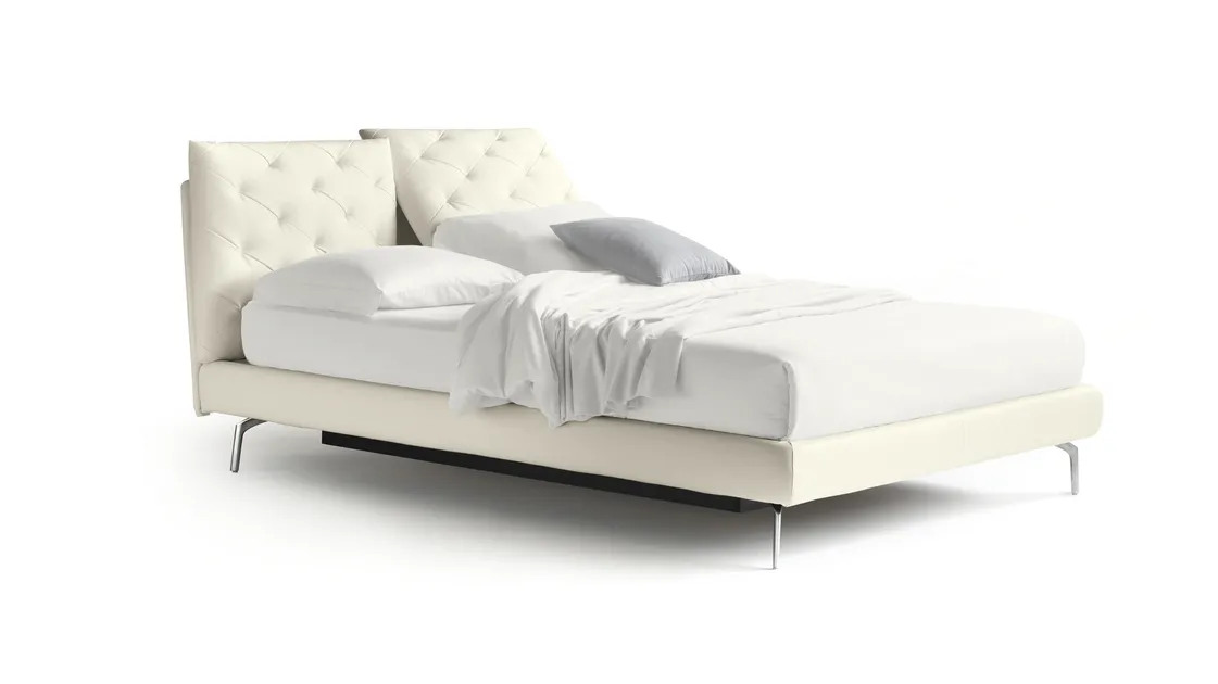 Double bed with capitonné processing applied to the two adjustable pillows of the headboard So Ever by Noctis.