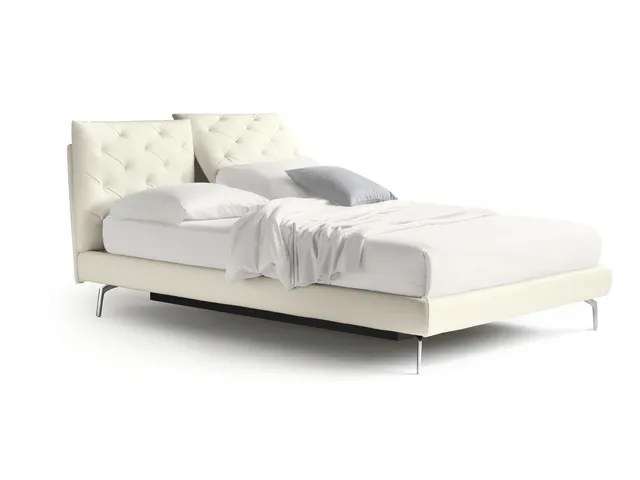 Double bed with capitonné processing applied to the two adjustable pillows of the headboard So Ever by Noctis.