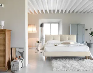 Upholstered double bed with So Lively headboard by Noctis.