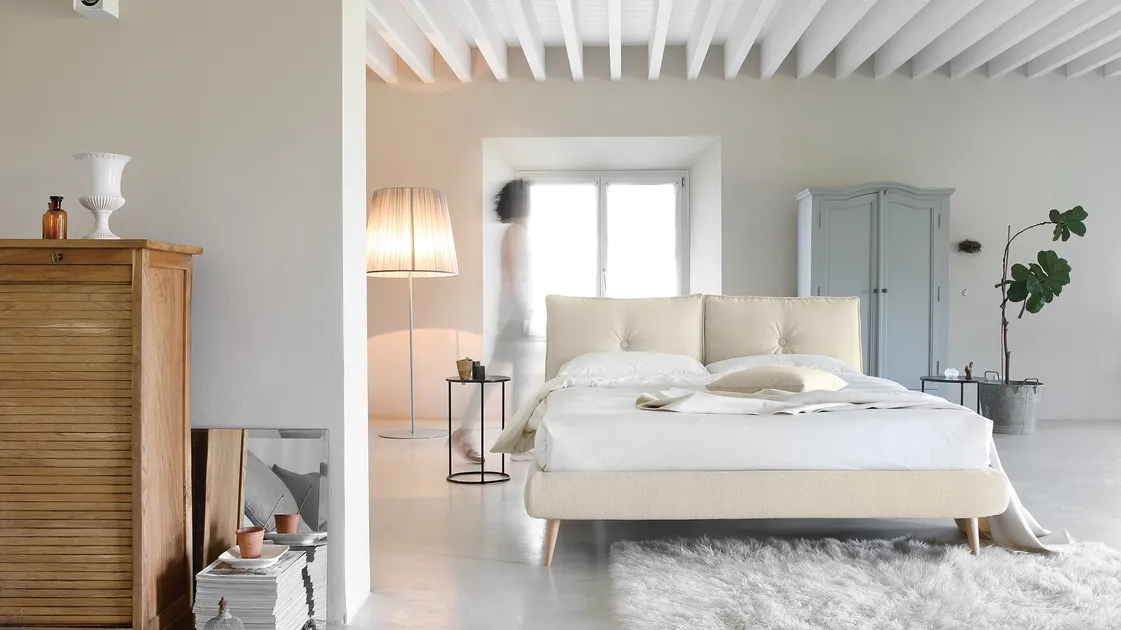 Upholstered double bed with So Lively headboard by Noctis.