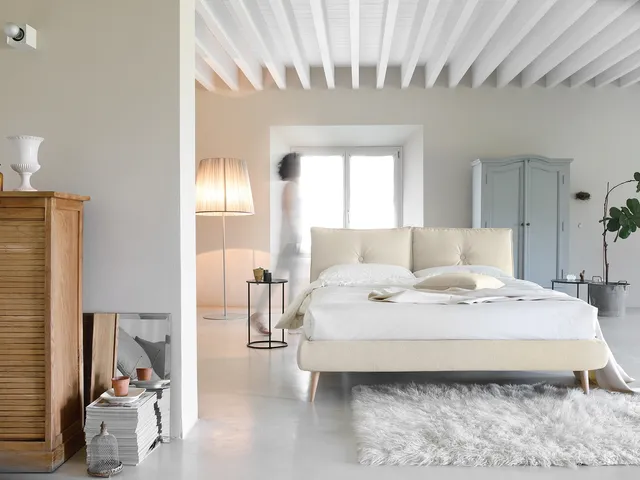 Upholstered double bed with So Lively headboard by Noctis.