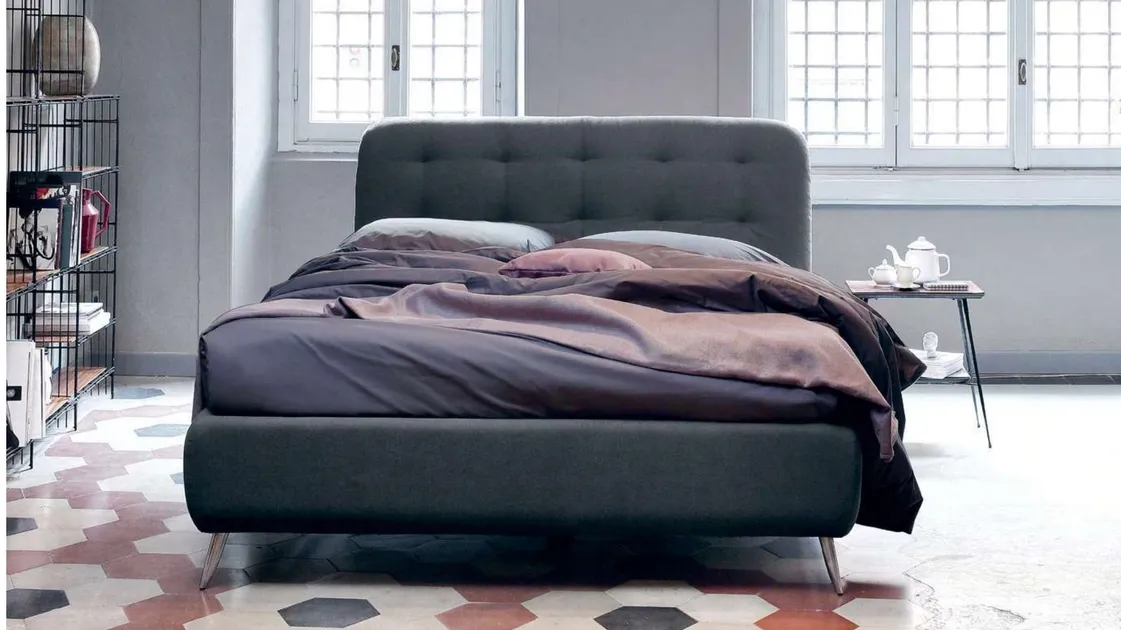 Upholstered fabric bed with Paco headboard by Noctis.