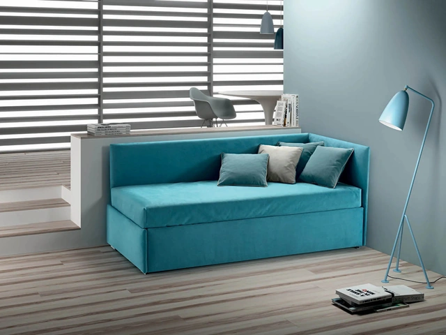 Single bed in fabric upholstered Twice High Corner by Bside.