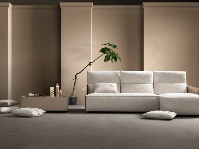 Relax fabric and leather sofa with Vibe Hit peninsula by Samoa