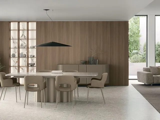 Fortuny table with stoneware top and metal structure by Tomasella.