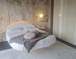 Roundy Leather Bed by Lago Floats