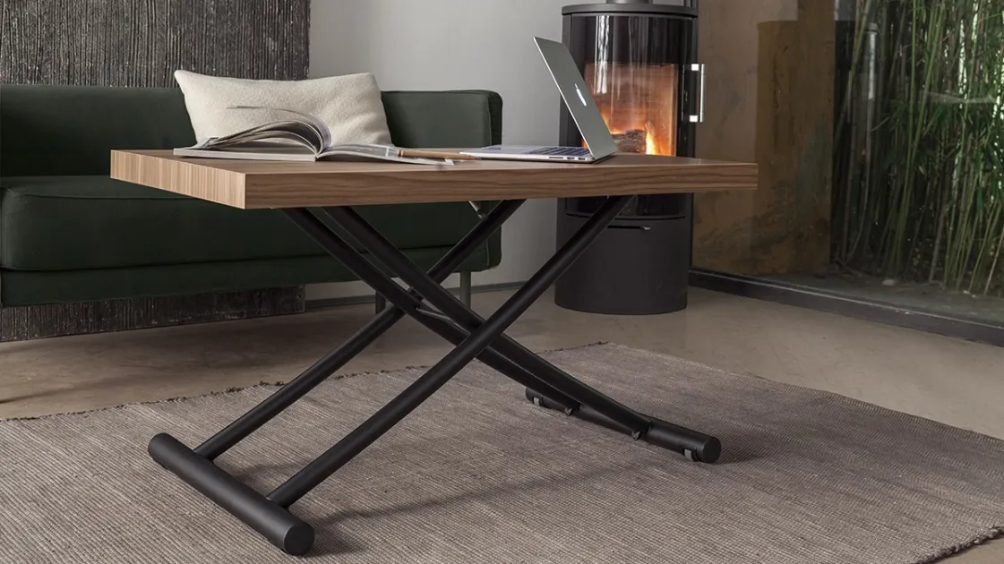 Transformable Genius coffee table with melamine top and metal base by Altacom.