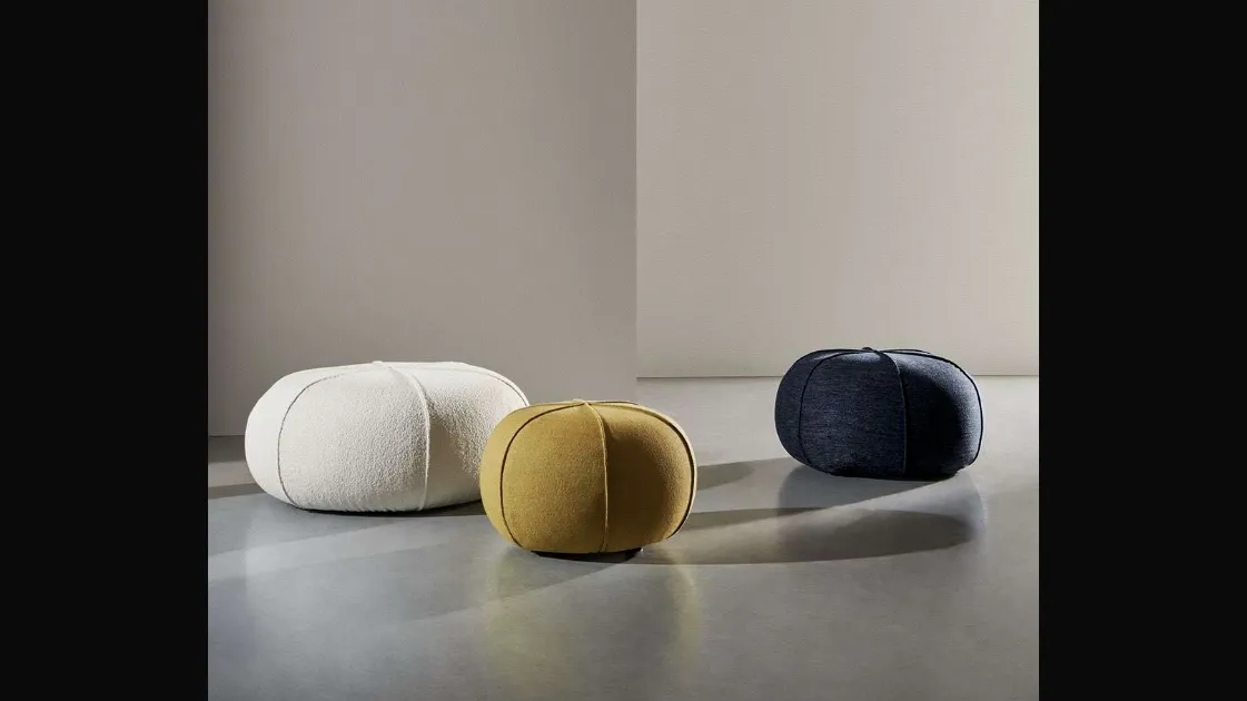 Pouf Clove upholstered in Twils fabric.