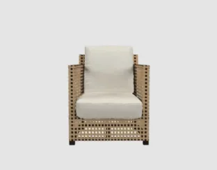 Perforated leather and fabric lounge chair WK by Gervasoni.