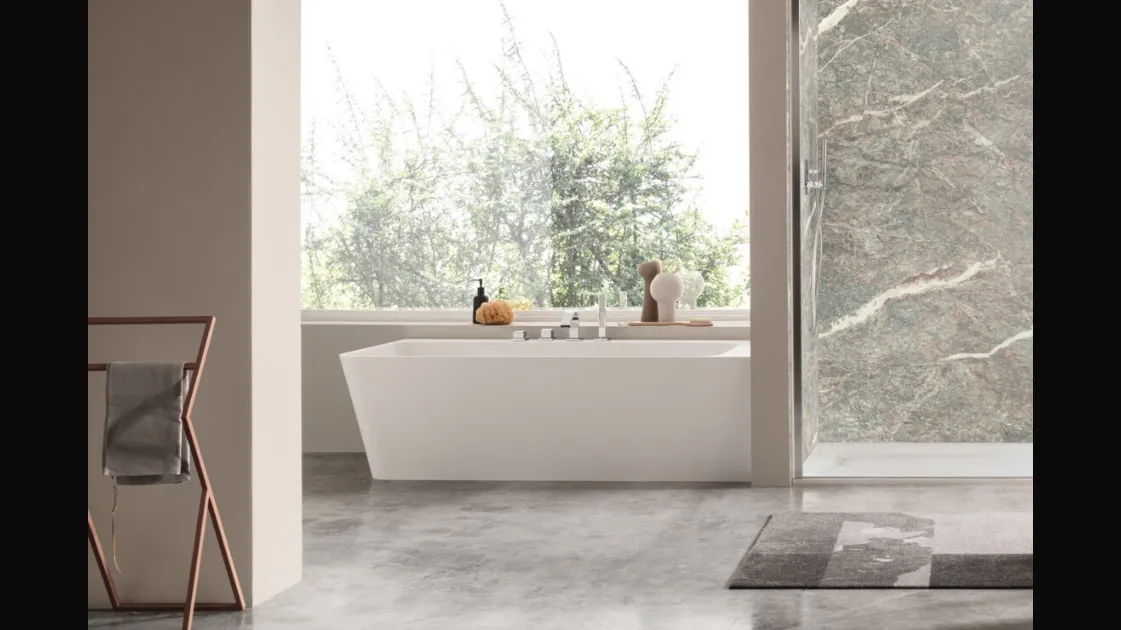 Eden corner bathtub by Arcom.