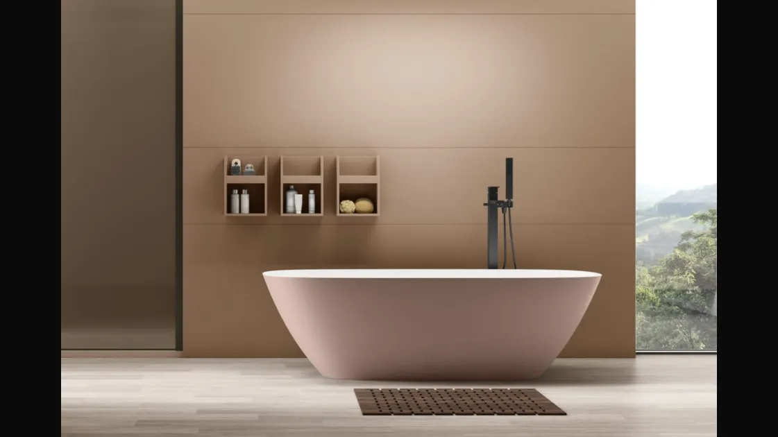 Freestanding bathtub in the shape of Arcom.