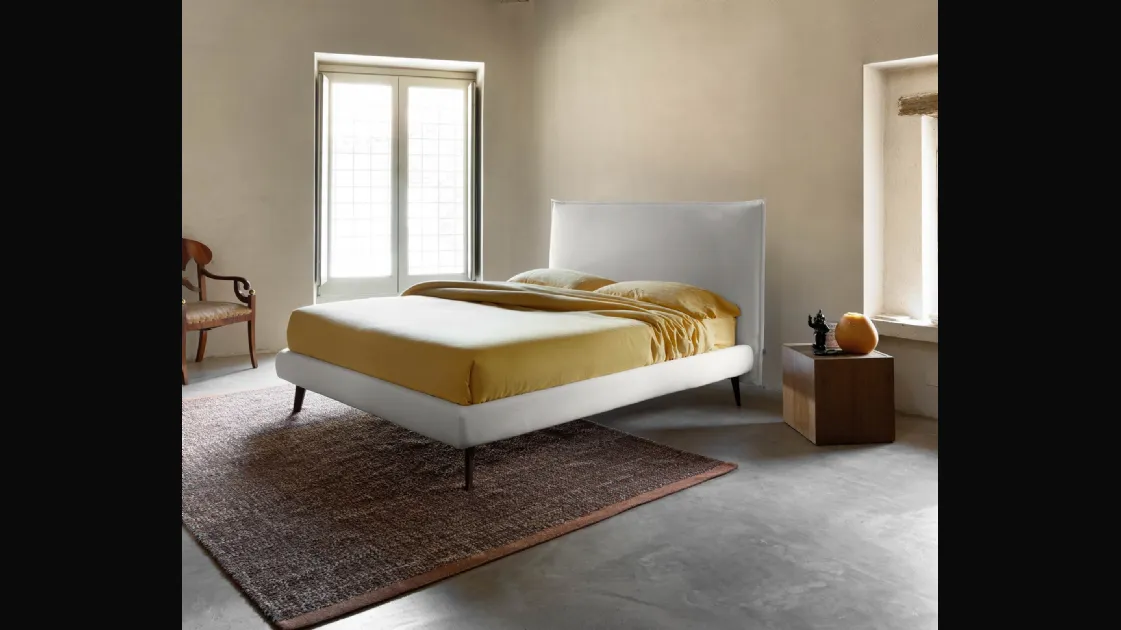 Minimal design bed in fabric with Bob headboard by Noctis.