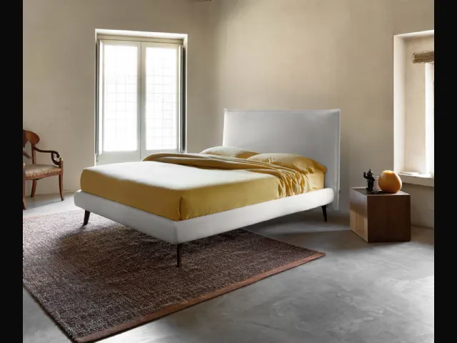 Minimal design bed in fabric with Bob headboard by Noctis.