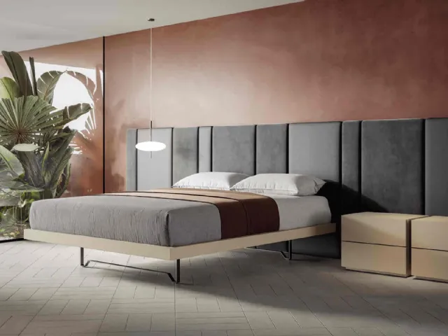 Double bed in fabric with large headboard Boiserie by Veneran.
