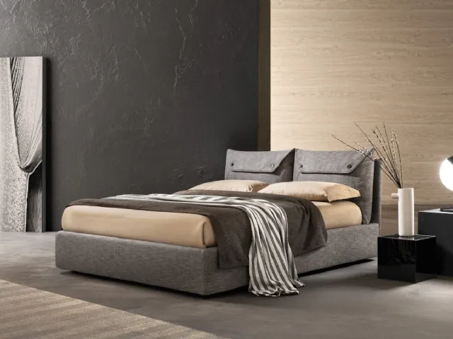 Upholstered fabric bed with headboard by Case di Bside.