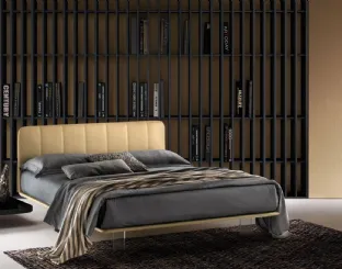 Leather bed with quilted headboard and transparent Clever legs by Bside.