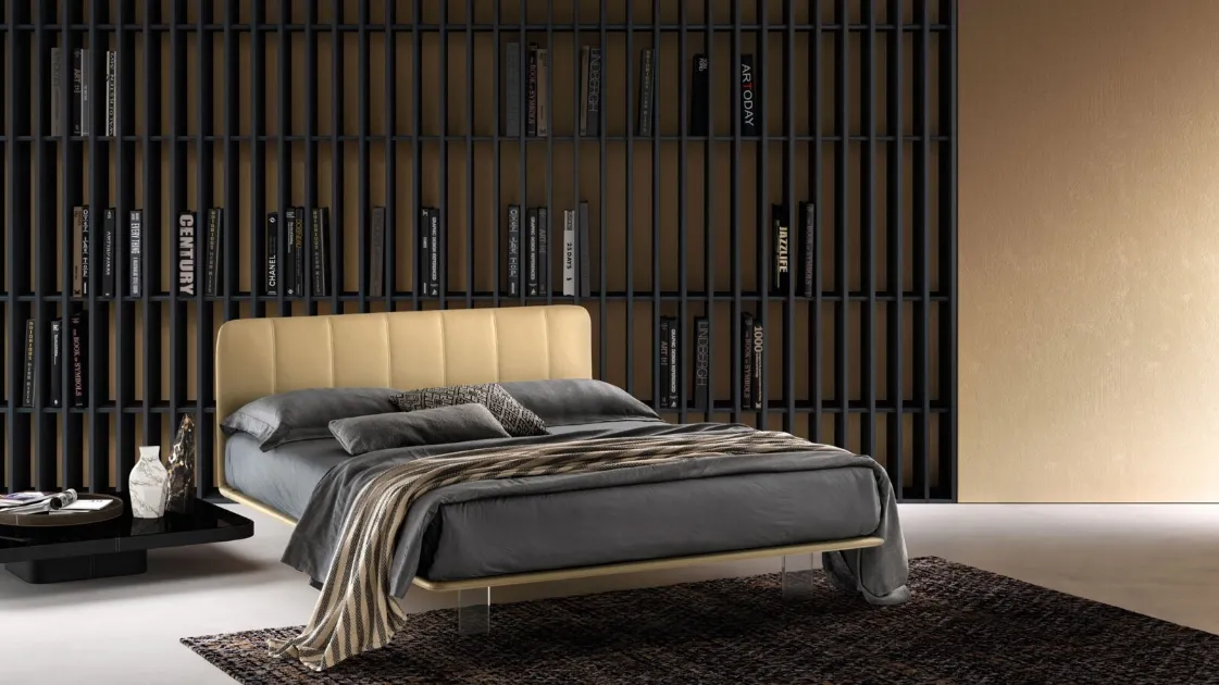 Leather bed with quilted headboard and transparent Clever legs by Bside.