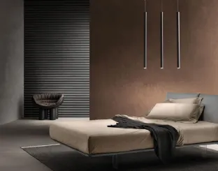 Fabric bed with Curious headboard by Bside.