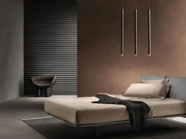 Fabric bed with Curious headboard by Bside.