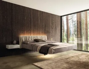 Suspended bed Floats 1631 with pleated leather headboard by Lago.