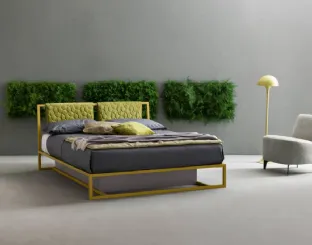 Double bed with quilted fabric headboard and metal Frame structure by Bside.