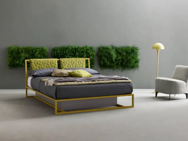 Double bed with quilted fabric headboard and metal Frame structure by Bside.