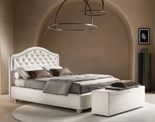 Bed in faux leather with shaped and quilted headboard Infinity by Bside.