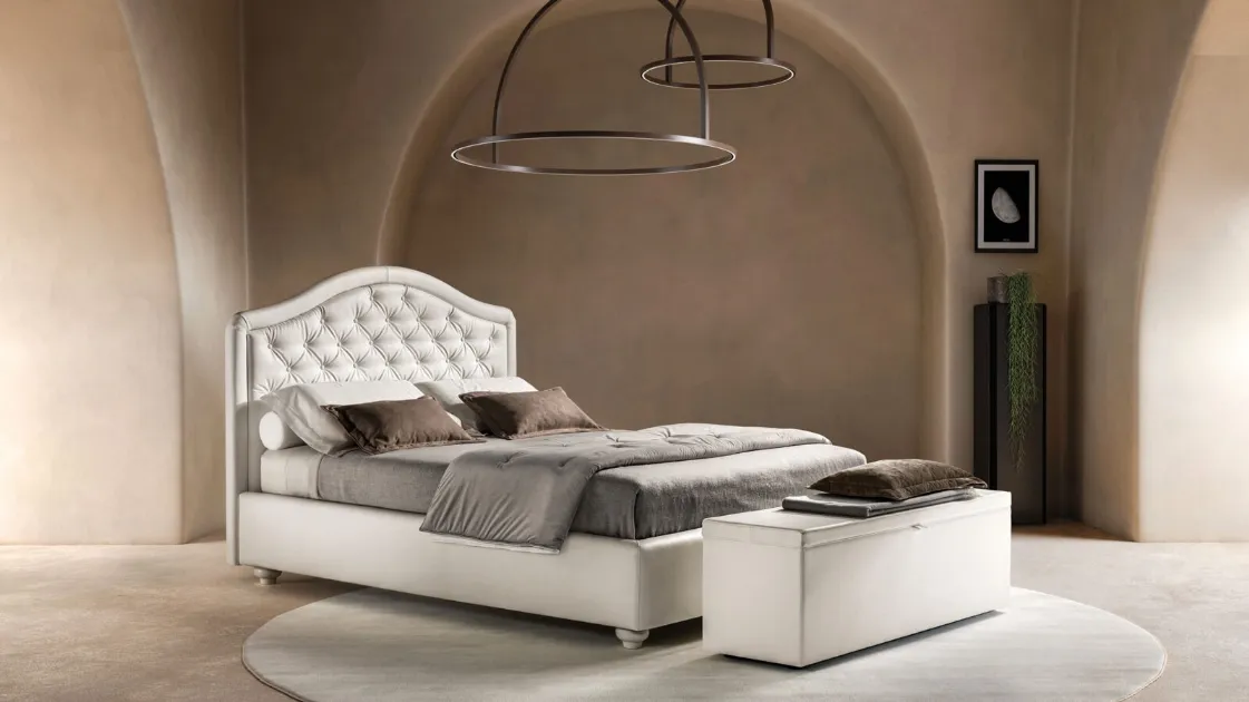 Bed in faux leather with shaped and quilted headboard Infinity by Bside.