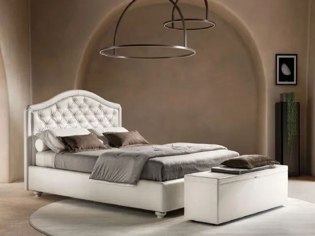 Bed in faux leather with shaped and quilted headboard Infinity by Bside.