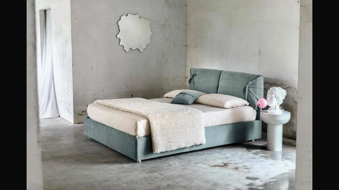 Jackie upholstered bed by Veneran.