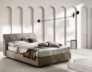 Upholstered fabric bed with quilted Kilt headboard by Bside.