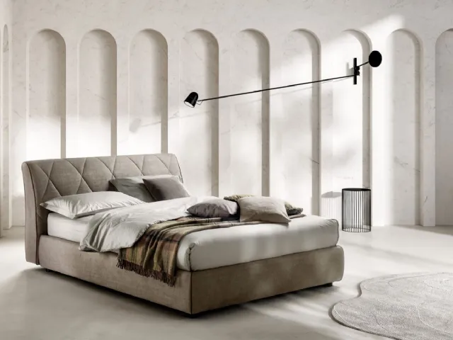 Upholstered fabric bed with quilted Kilt headboard by Bside.
