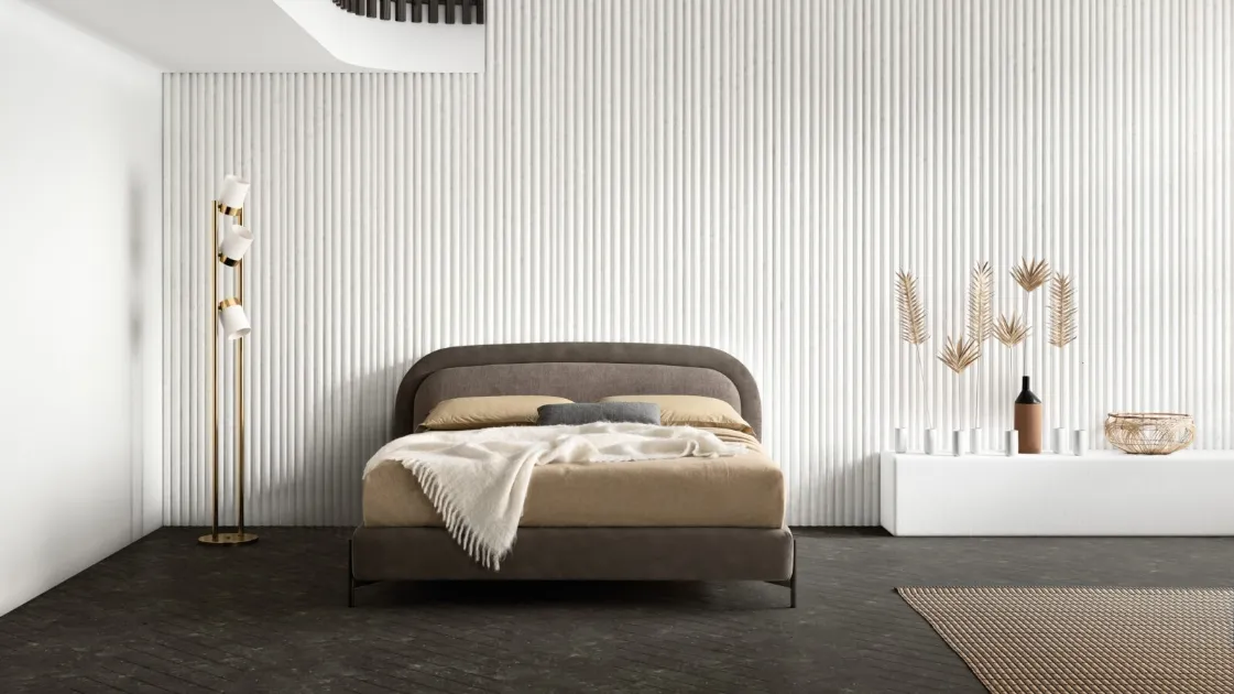 Double bed with rounded edge headboard 