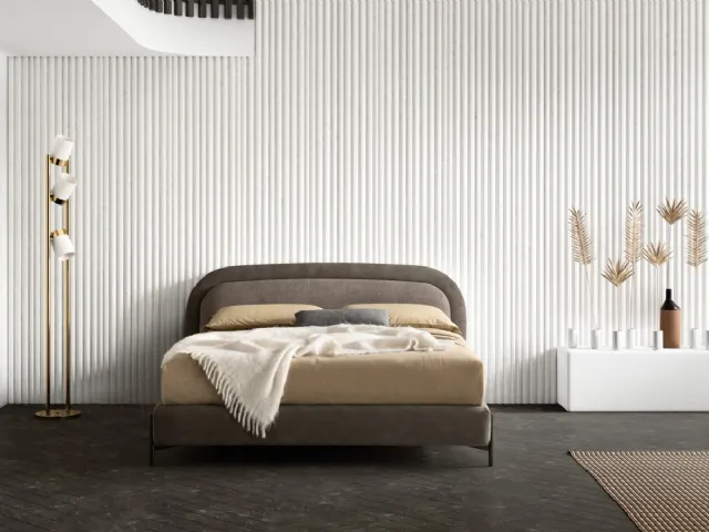 Double bed with rounded edge headboard 