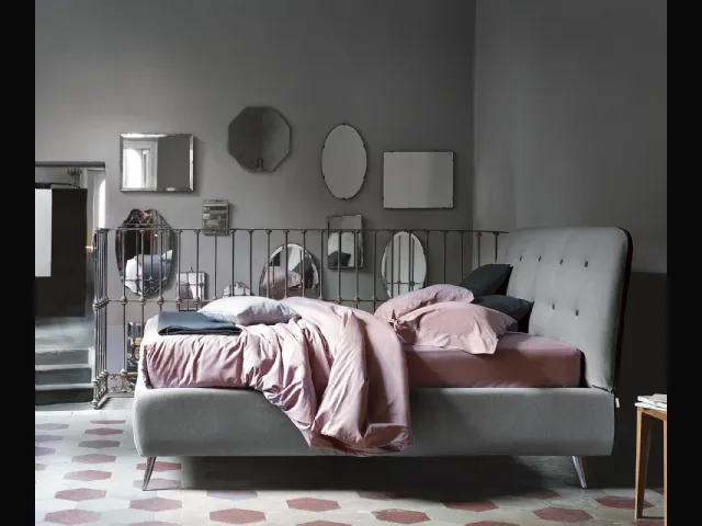 Upholstered fabric bed with Paco headboard by Noctis.