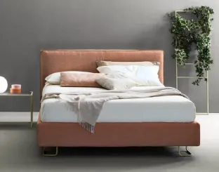 Modern fabric bed with Bside Piping headboard.