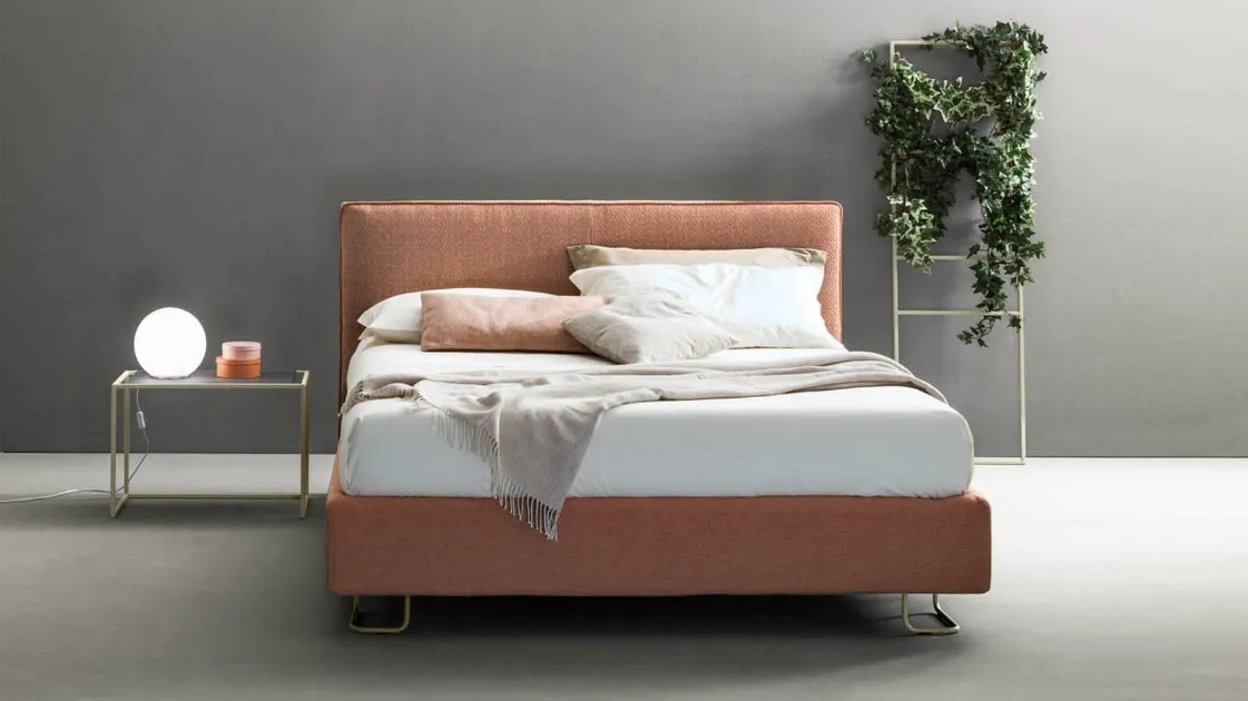 Modern fabric bed with Bside Piping headboard.