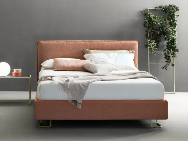 Modern fabric bed with Bside Piping headboard.
