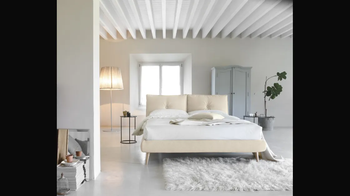 Upholstered double bed with So Lively headboard by Noctis.